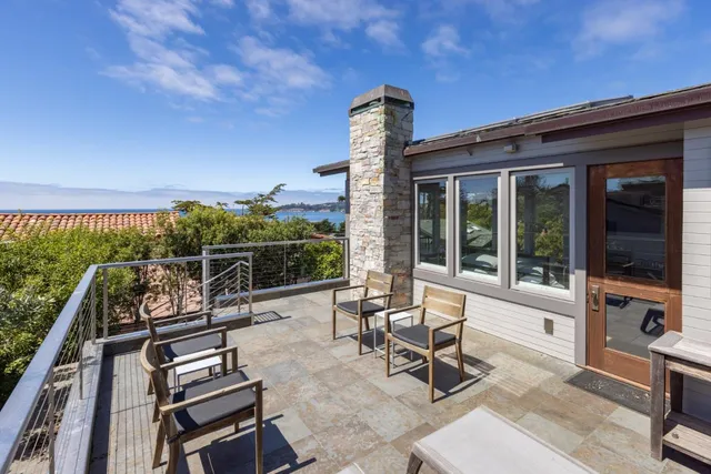a view of a terrace with chairs