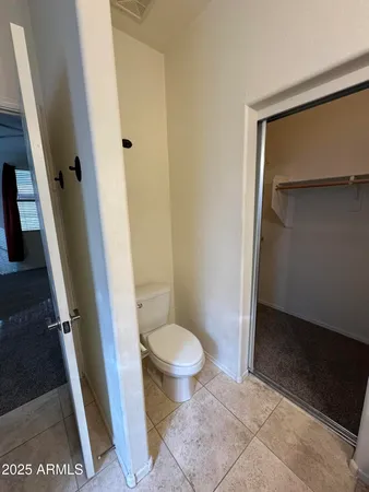 a en suite bathroom with a sink a mirror and a bathtub