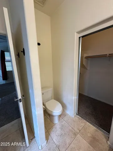 a en suite bathroom with a sink a mirror and a bathtub