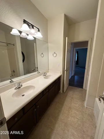 a view of an empty room and a window