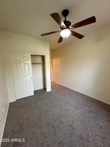 a spacious bathroom with a double vanity sink and a mirror