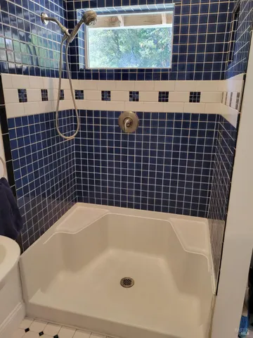 a bathroom with a bathtub
