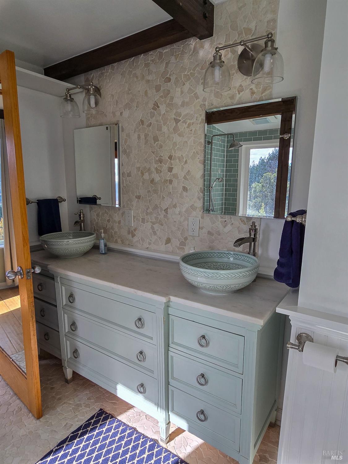 47111 Fox Rock Road Laytonville, CA 95454 - Photo 27 of 44 a bathroom with a granite countertop sink vanity mirror and bathtub