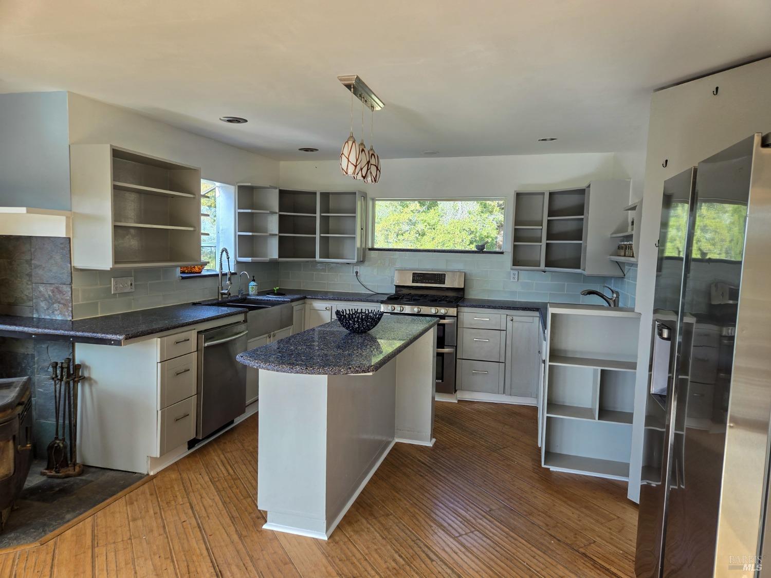47111 Fox Rock Road Laytonville, CA 95454 - Photo 9 of 44 a kitchen with stainless steel appliances granite countertop a stove and a sink