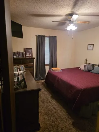 a room with gym equipment and a mirror