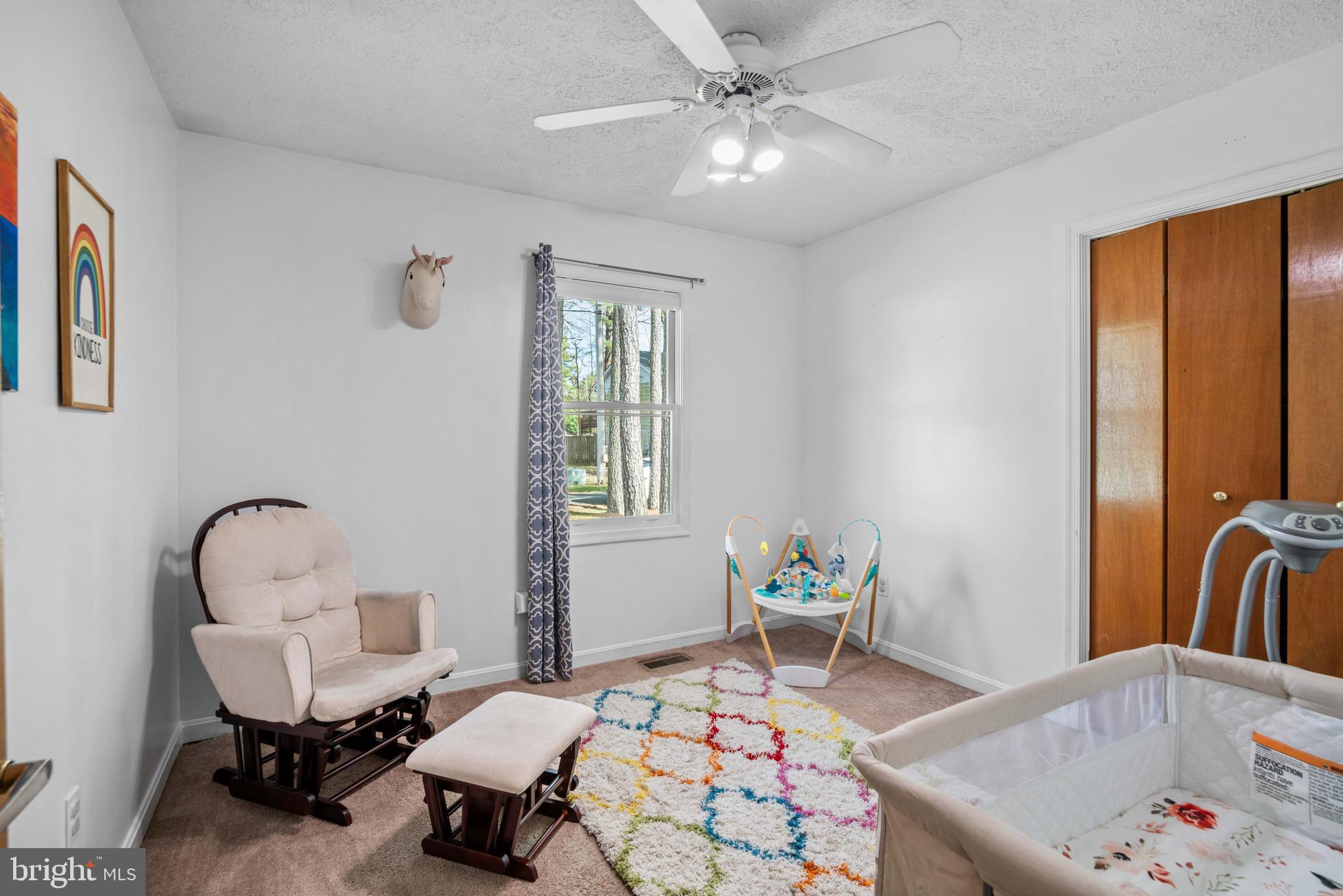 11543 San Rafael Road Lusby, MD 20657 - Photo 9 of 20 a bedroom with a bed and a table in it