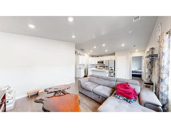 a living room with furniture and a couch