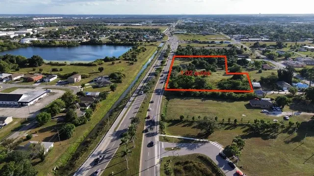 an aerial view of lake and residential houses