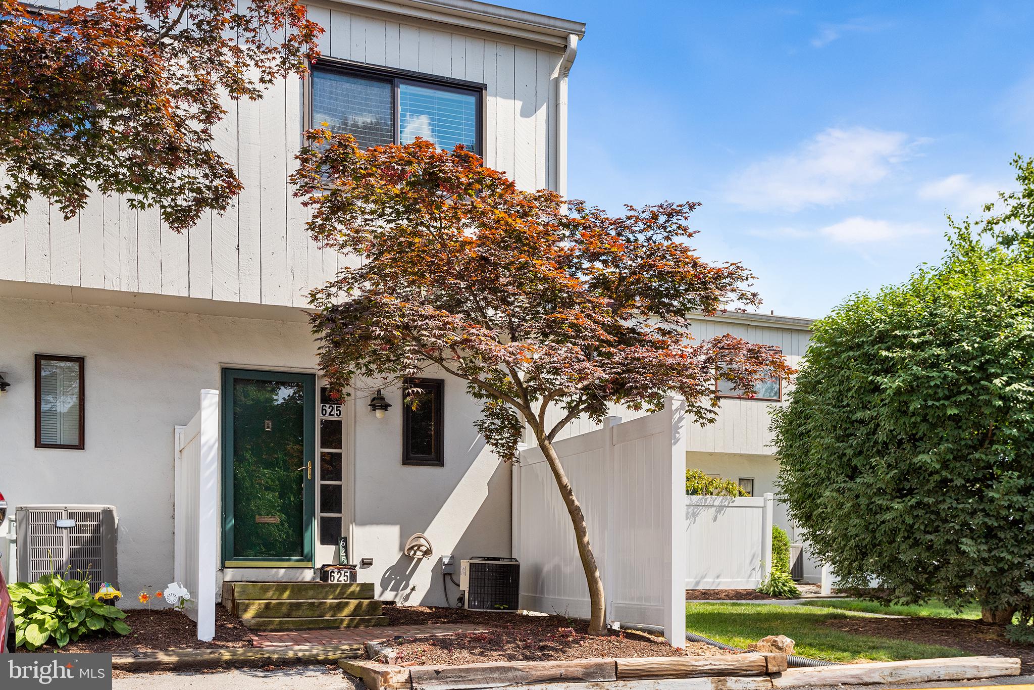 625 Summit House West Chester, PA 19382 - Photo 1 of 16 a view of a house with a tree in front