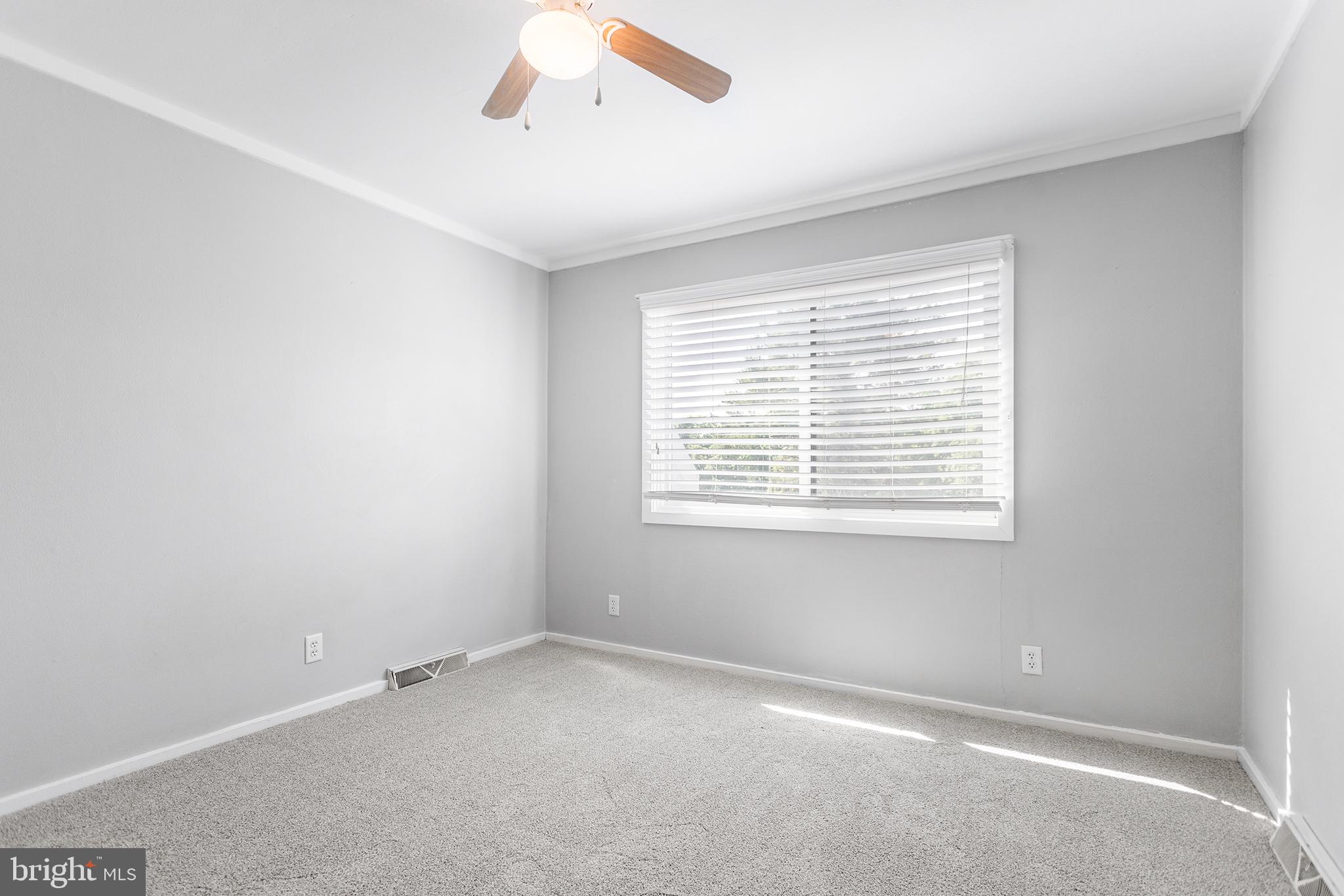625 Summit House West Chester, PA 19382 - Photo 12 of 16 an empty room with a window