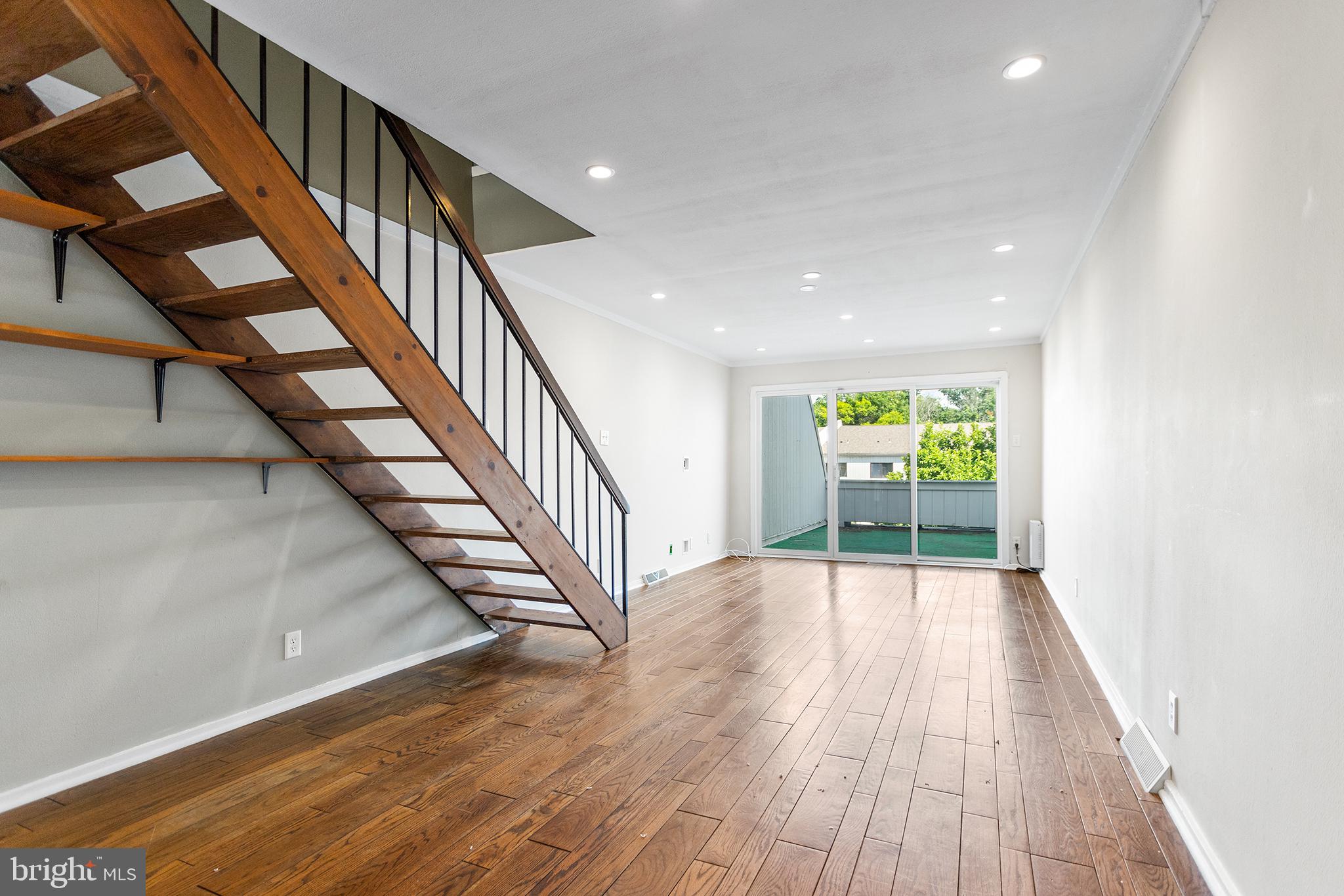 625 Summit House West Chester, PA 19382 - Photo 5 of 16 a view of an entryway with wooden floor