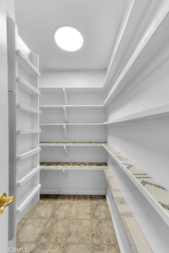 30673 Del Rey Road Temecula, CA 92591 - Photo 20 of 47 Opposite From Kitchen Is Very Spacious Pantry With Selves Galore. New Overhead LED Lighting.