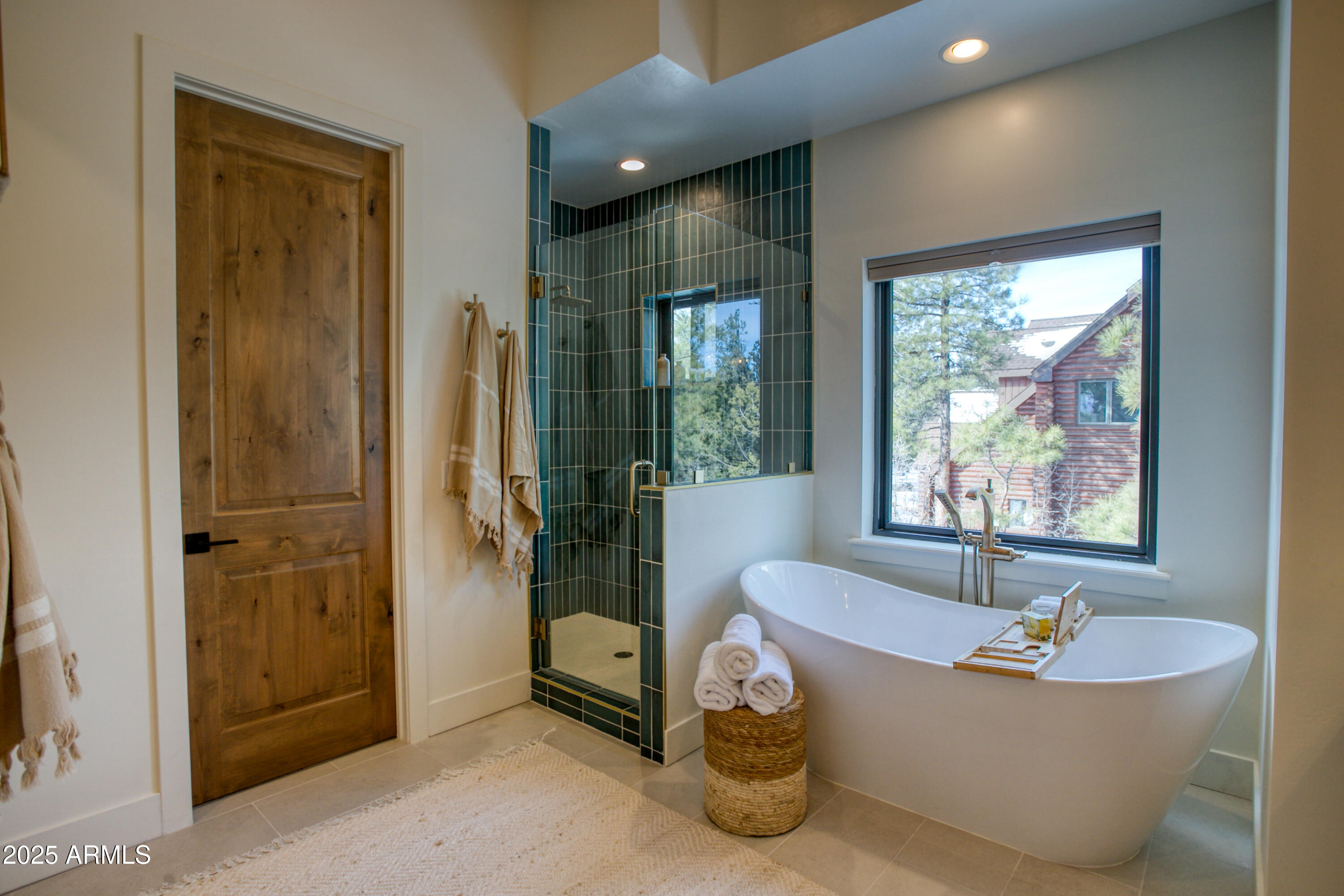 4500 West Hackberry Lane, Unit 161 Show Low, AZ 85901 - Photo 19 of 33 a bath tub sitting in a bathroom next to a tub