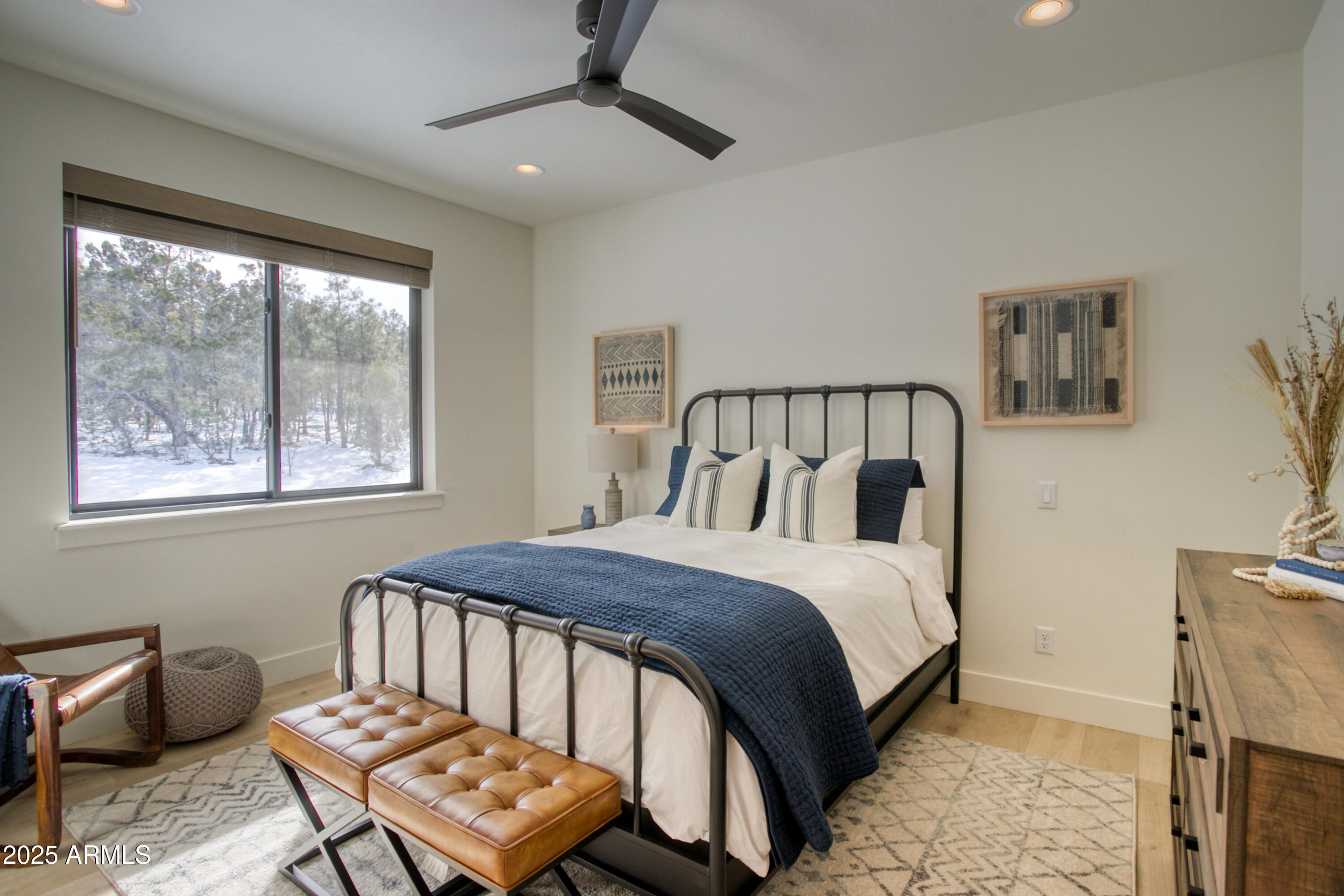 4500 West Hackberry Lane, Unit 161 Show Low, AZ 85901 - Photo 20 of 33 a bedroom with a bed next to a window