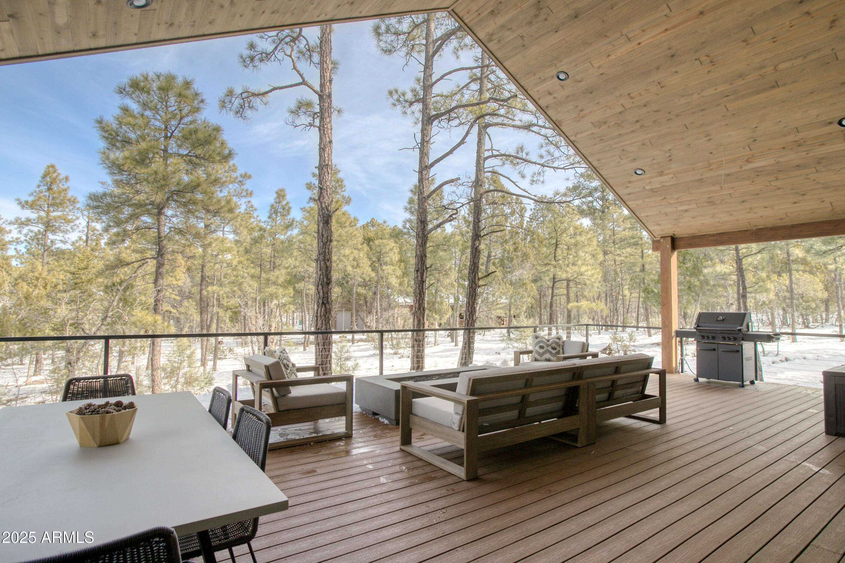 4500 West Hackberry Lane, Unit 161 Show Low, AZ 85901 - Photo 29 of 33 a roof deck with couches and wooden floor