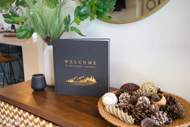 a vase of flowers sitting on a table