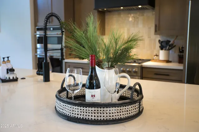 a view of living room with furniture and potted plants