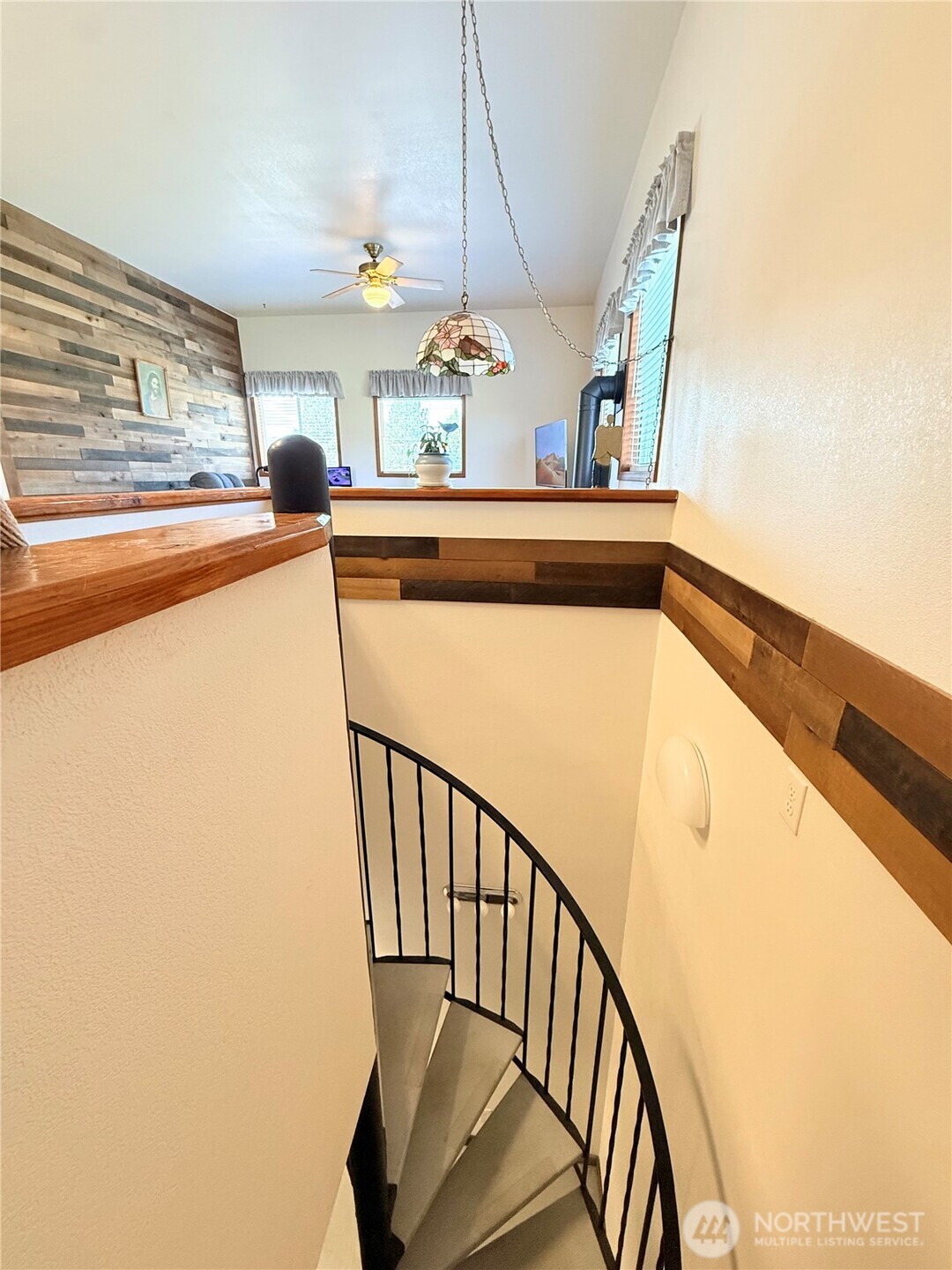 63 Shumway Road Omak, WA 98841 - Photo 18 of 39 a view of a hallway with stairs