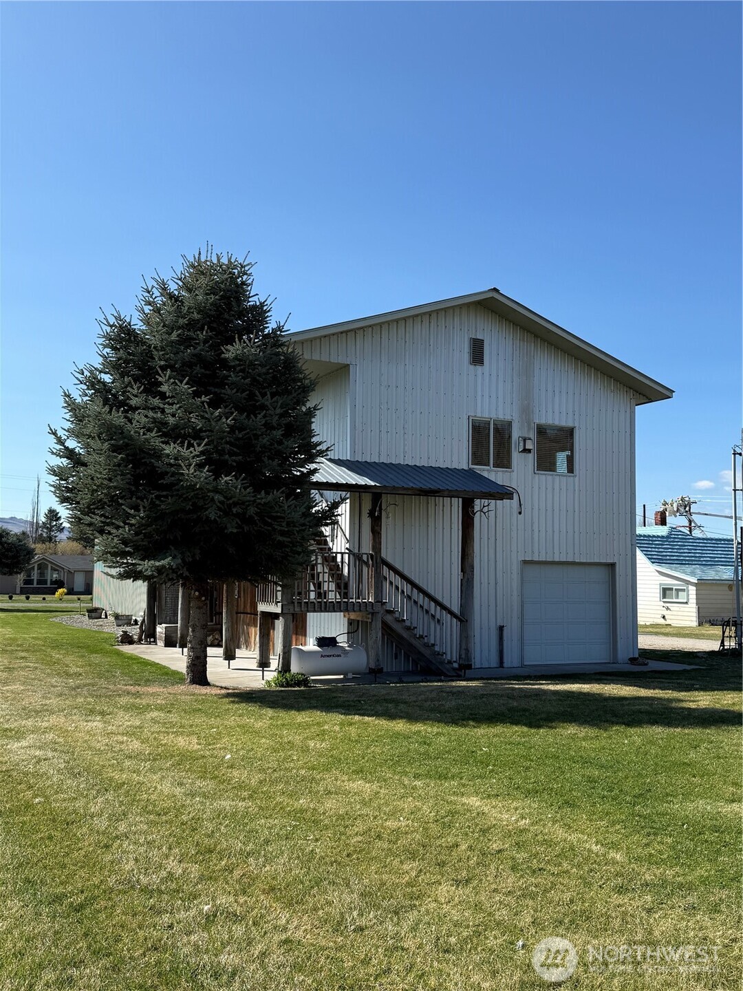 63 Shumway Road Omak, WA 98841 - Photo 2 of 39 a front view of house with yard