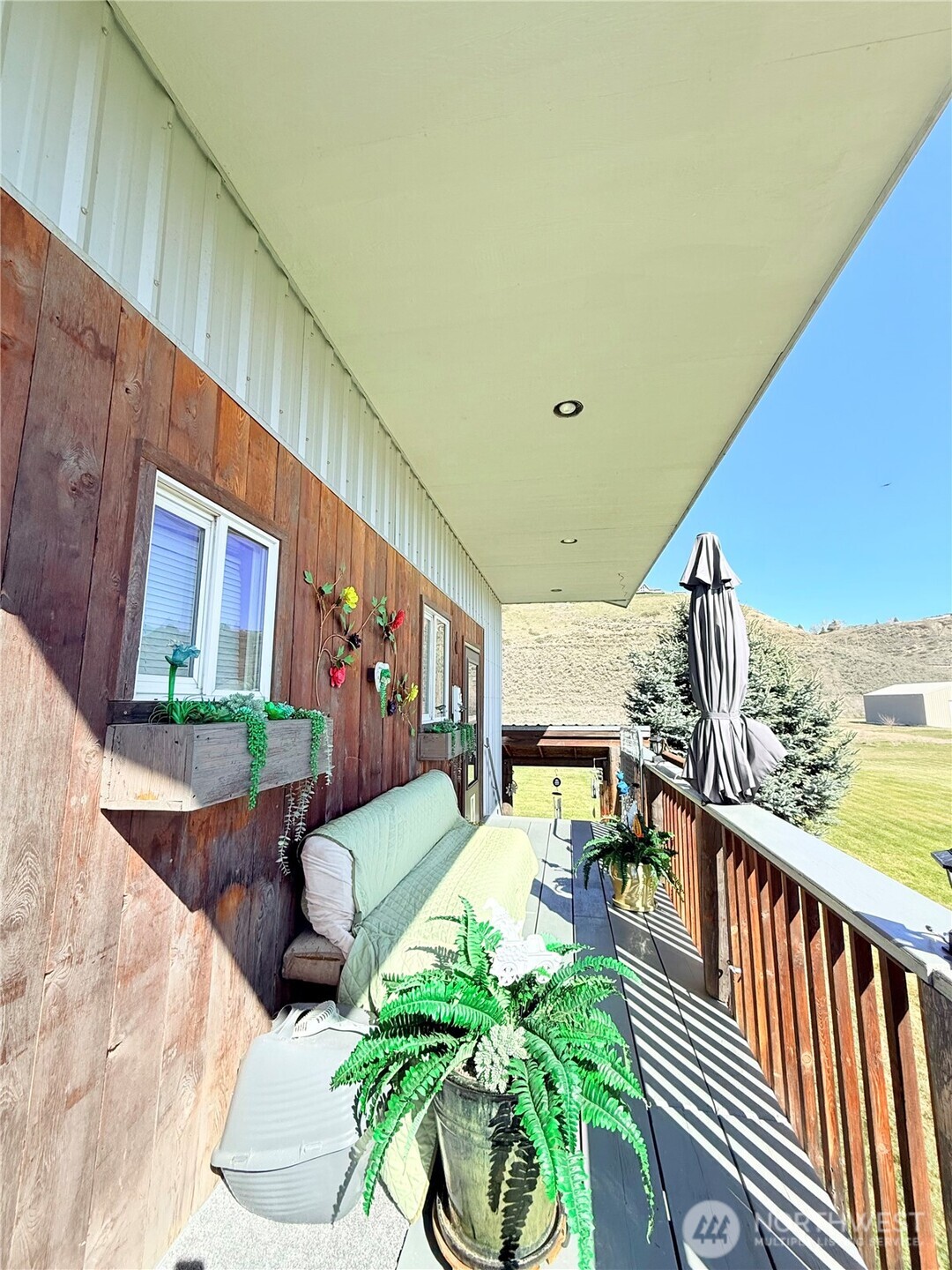 63 Shumway Road Omak, WA 98841 - Photo 32 of 39 a balcony with view of outdoor seating