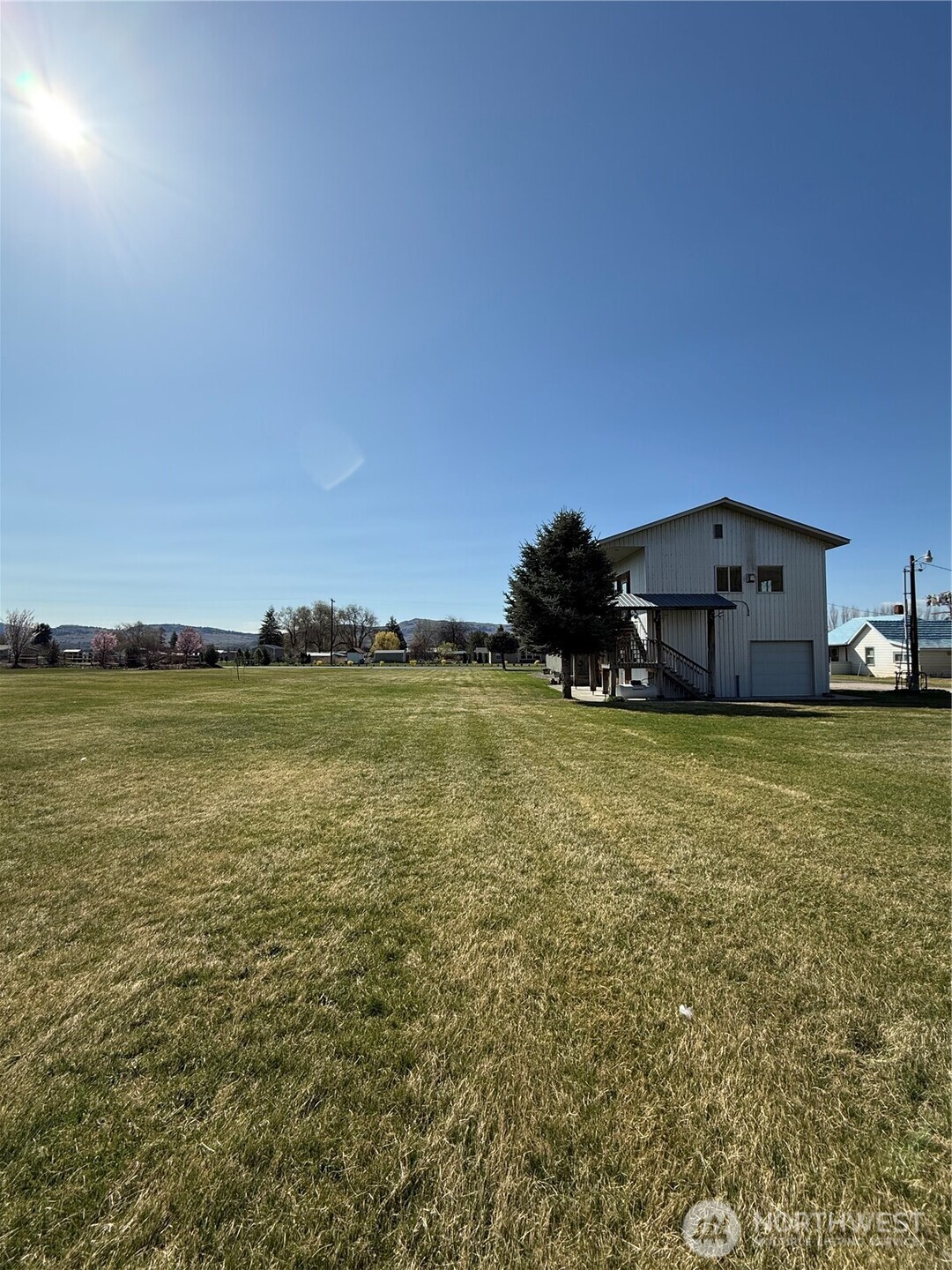 63 Shumway Road Omak, WA 98841 - Photo 37 of 39 a house view with a garden space