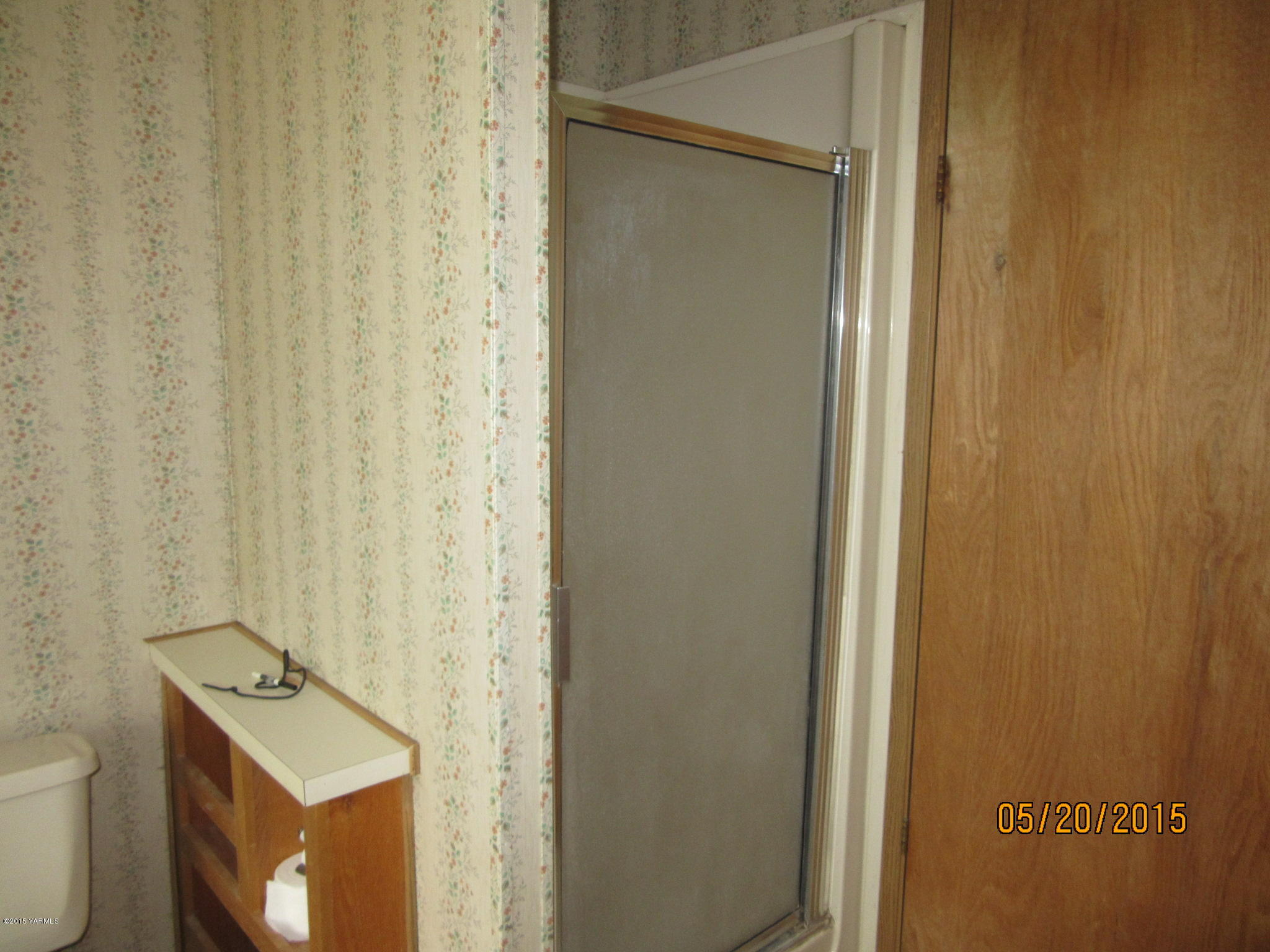 1510 Gurley Road Granger, WA 98932 - Photo 29 of 29 a bathroom with a sink toilet and shower