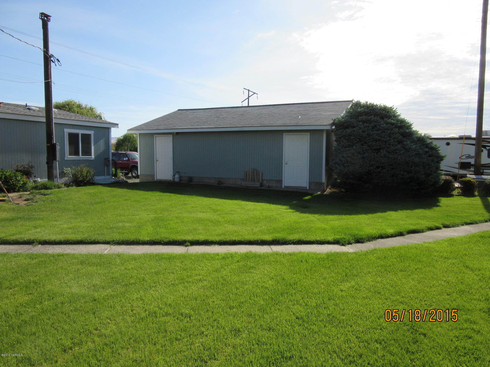 1510 Gurley Road Granger, WA 98932 - Photo 8 of 29 a view of a yard in front of a house