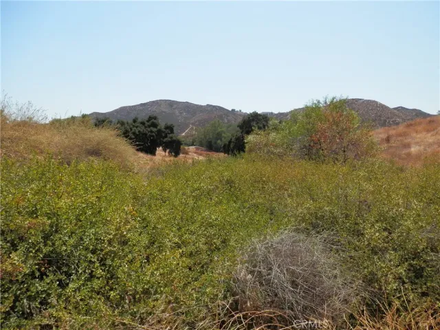 a view of a lake with mountains in the background