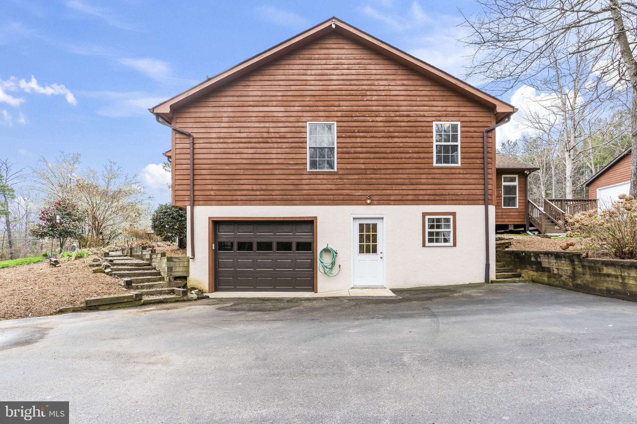 12345 H G Trueman Road Lusby, MD 20657 - Photo 26 of 38 Attached 1 car garage & separate basement entry