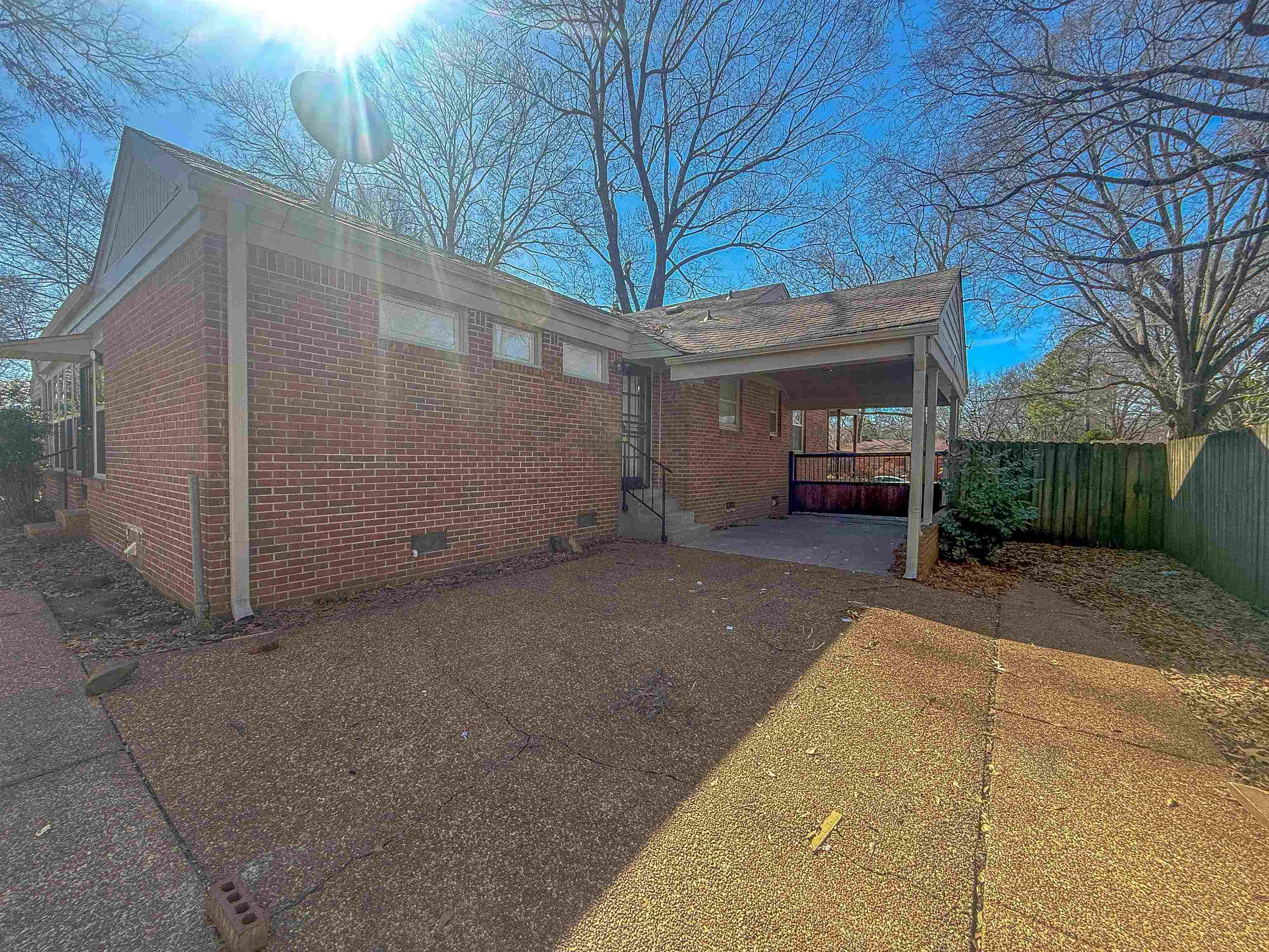 1050 Marcia Road Memphis, TN 38117 - Photo 17 of 20 a view of a house with a yard