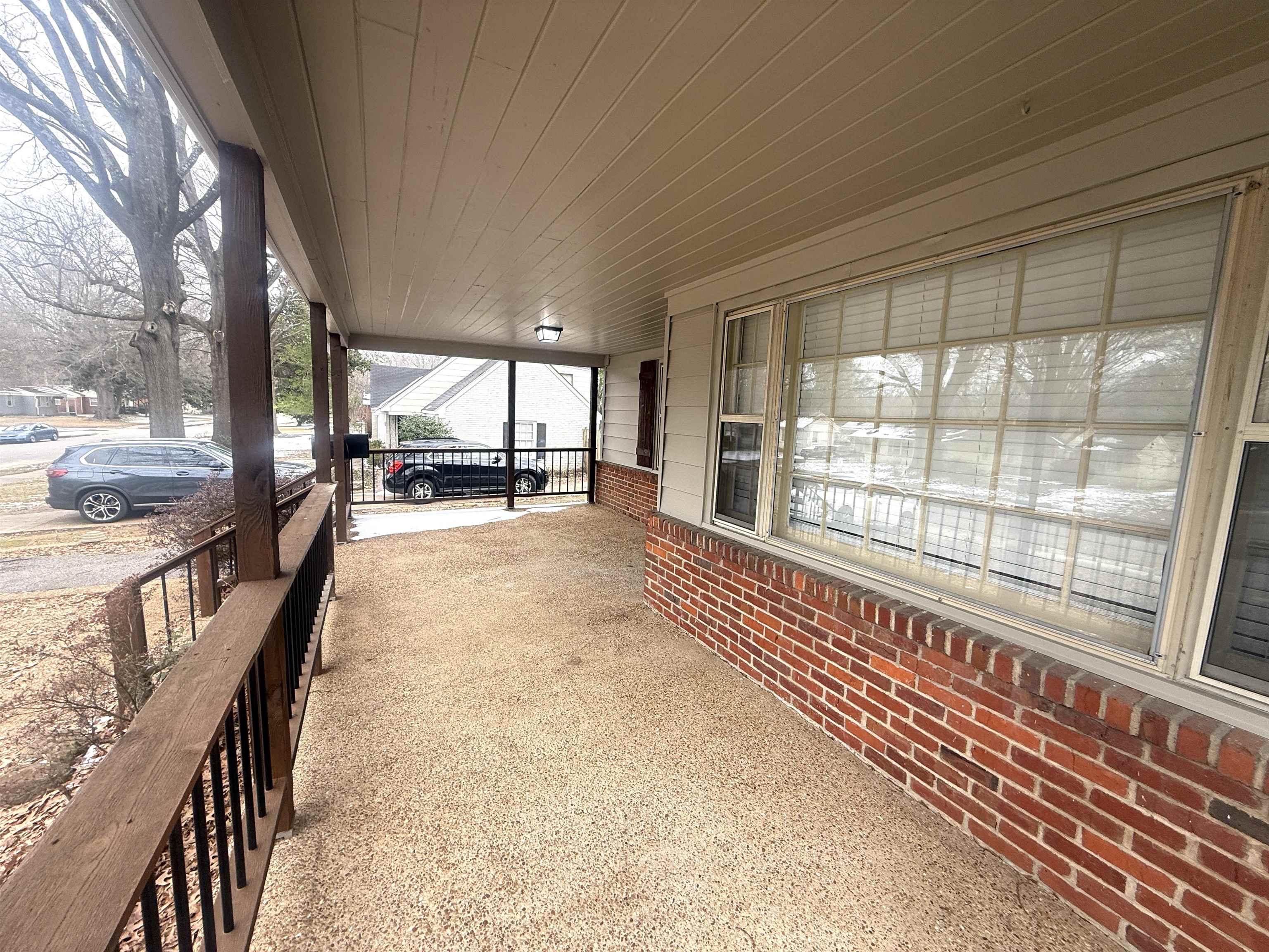 1050 Marcia Road Memphis, TN 38117 - Photo 3 of 20 a view of a large room with windows