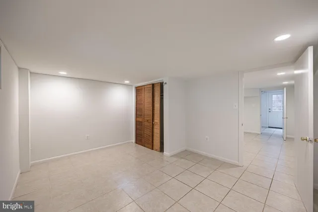 an empty room with a natural light