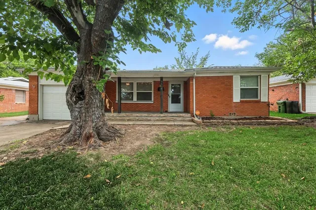 front view of house with a yard