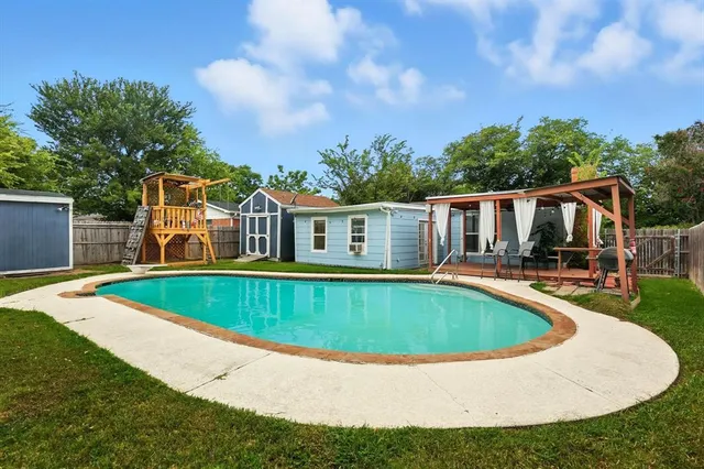 a view of outdoor space yard swimming pool and porch