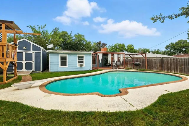 a view of outdoor space yard and swimming pool