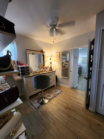 a room with a chair and gym equipment