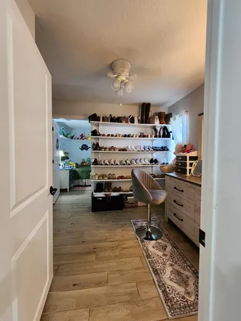 a view of utility room and kitchen