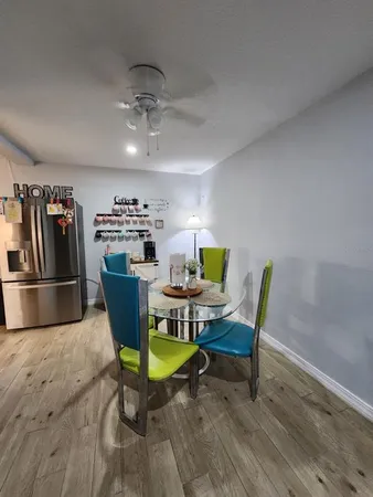 a view of a dining room with furniture
