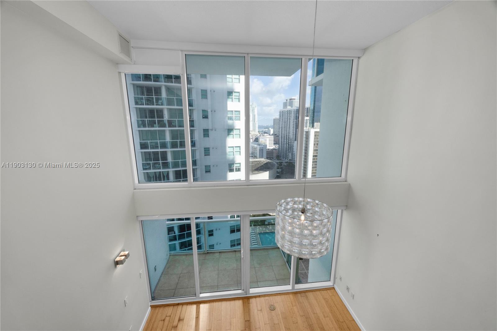 41 Southeast 5th Street, Unit 1515 Miami, FL 33131 - Photo 12 of 25 a view of a balcony with chair
