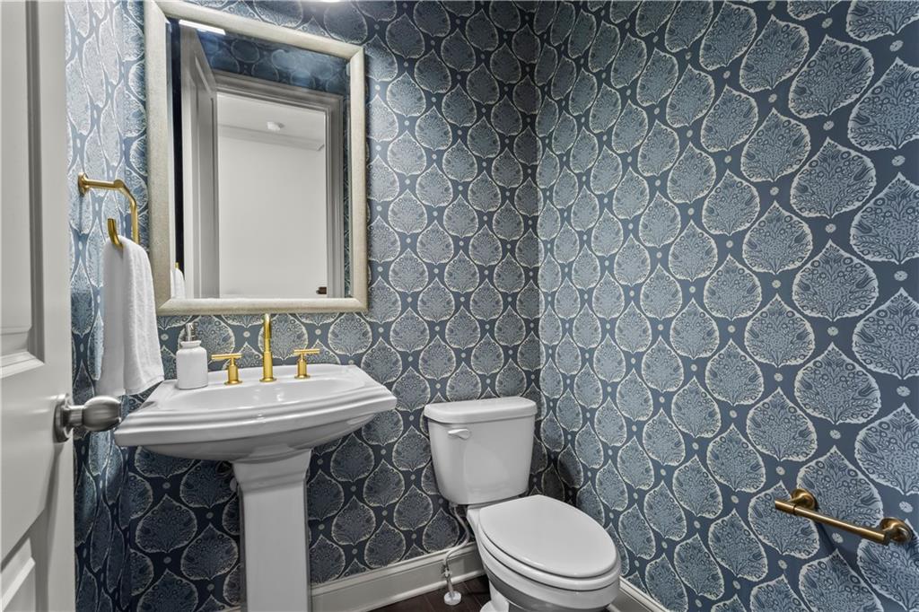 1892 Skyfall Circle Brookhaven, GA 30319 - Photo 12 of 24 a bathroom with a sink and a toilet