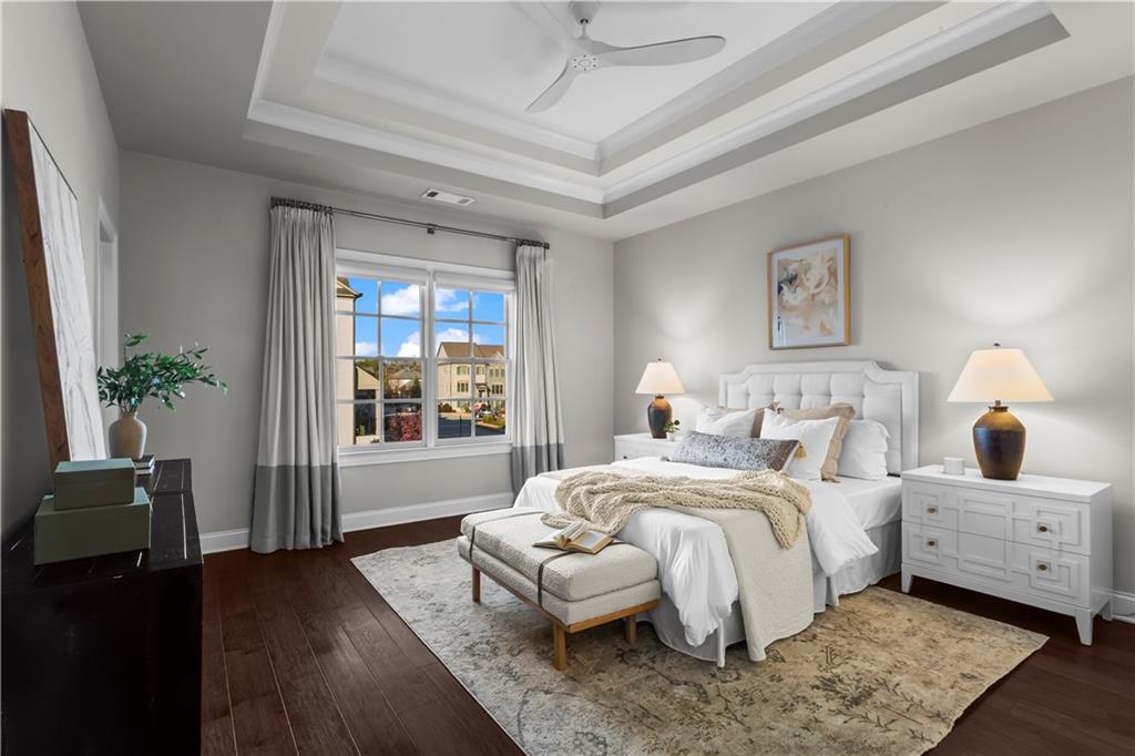 1892 Skyfall Circle Brookhaven, GA 30319 - Photo 13 of 24 a bedroom with a large bed and a window