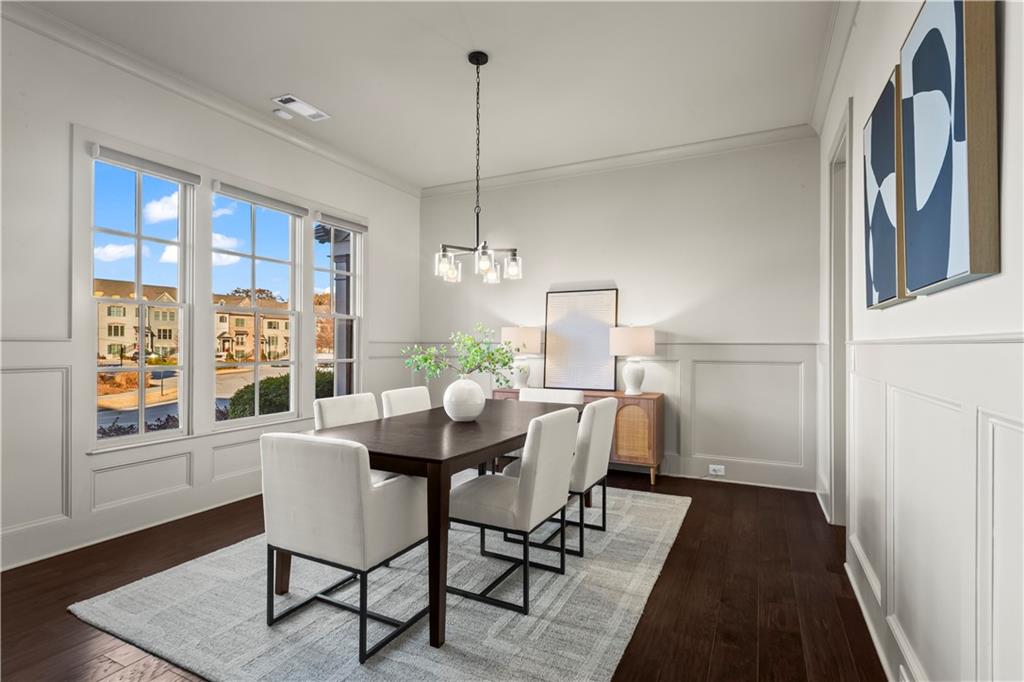 1892 Skyfall Circle Brookhaven, GA 30319 - Photo 2 of 24 a view of a dining room with furniture window and wooden floor
