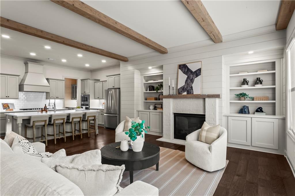 1892 Skyfall Circle Brookhaven, GA 30319 - Photo 4 of 24 a living room with furniture and a fireplace