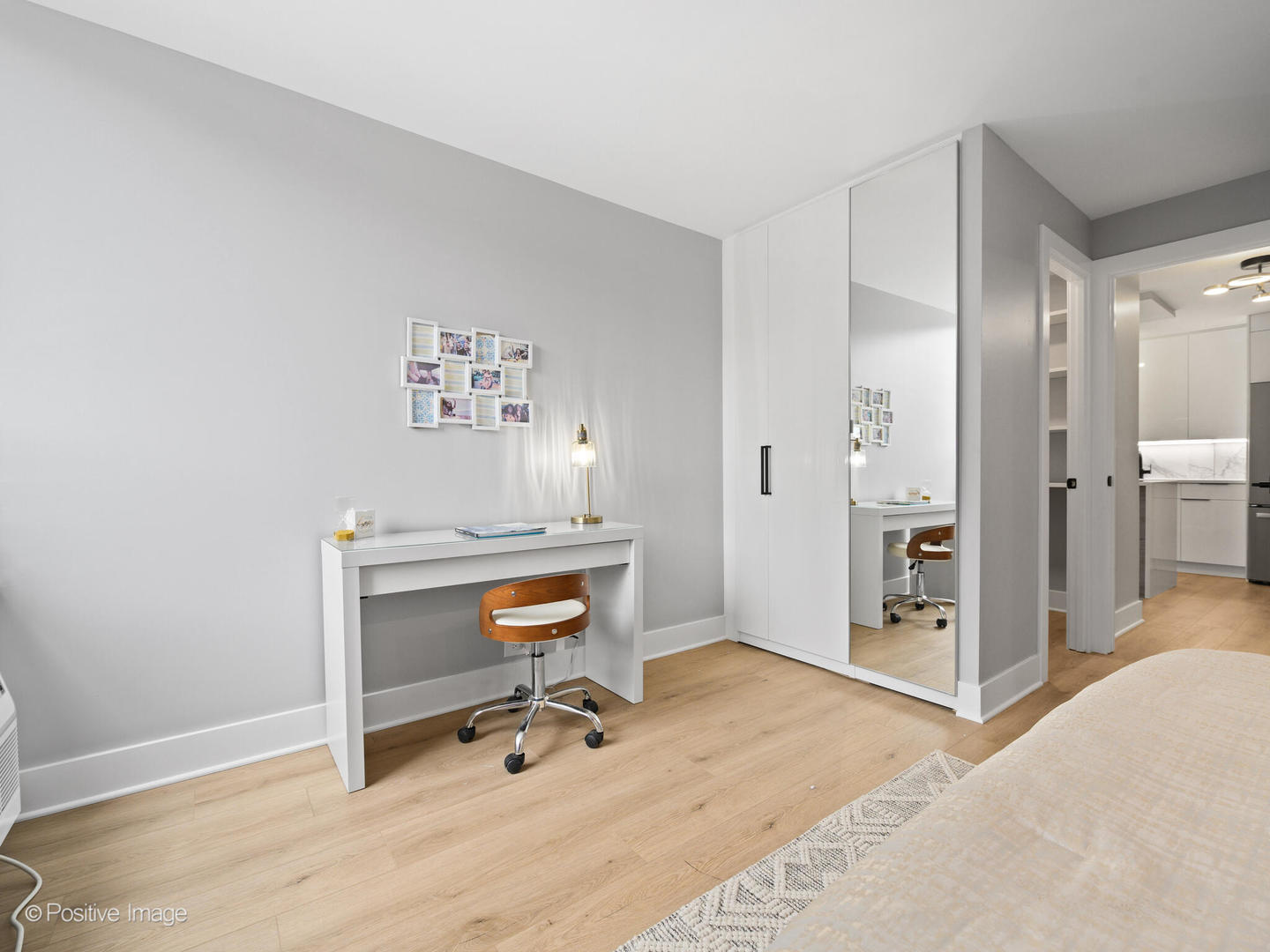 1455 North Sandburg Terrace, Unit 209B Chicago, IL 60610 - Photo 13 of 33 a view of a livingroom with a chair and front door