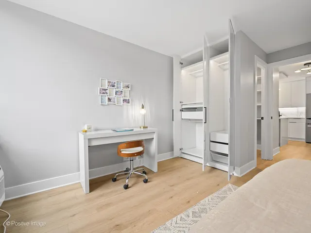 a room with a desk and chair