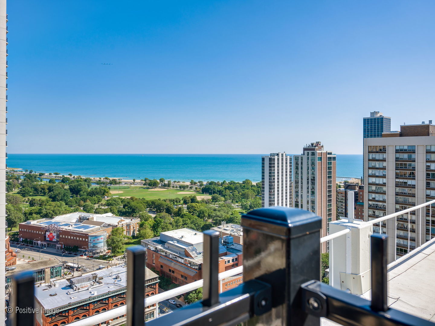 1455 North Sandburg Terrace, Unit 209B Chicago, IL 60610 - Photo 23 of 33 a view of a city from a balcony