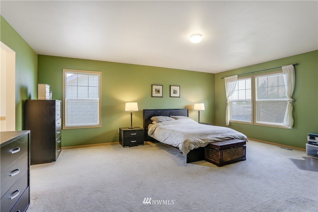 2310 Southeast 3rd Street Renton, WA 98056 - Photo 20 of 30 a bedroom with a bed and a window