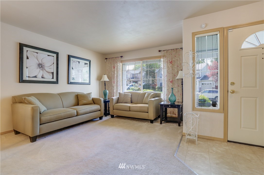 2310 Southeast 3rd Street Renton, WA 98056 - Photo 3 of 30 a living room with furniture and a large window