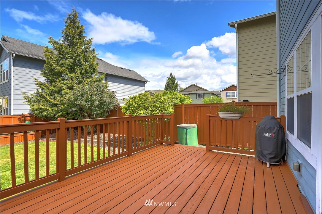 2310 Southeast 3rd Street Renton, WA 98056 - Photo 26 of 30 a view of balcony with wooden floor and fence