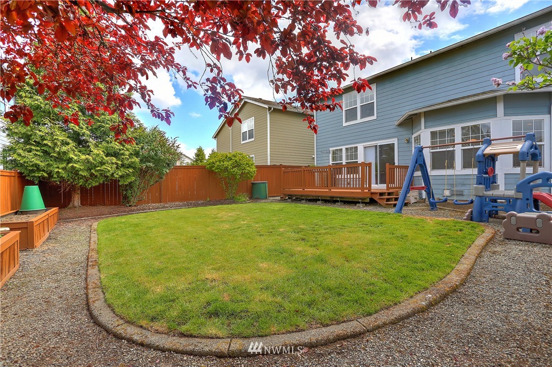 2310 Southeast 3rd Street Renton, WA 98056 - Photo 29 of 30 a view of a house with a backyard porch and sitting area